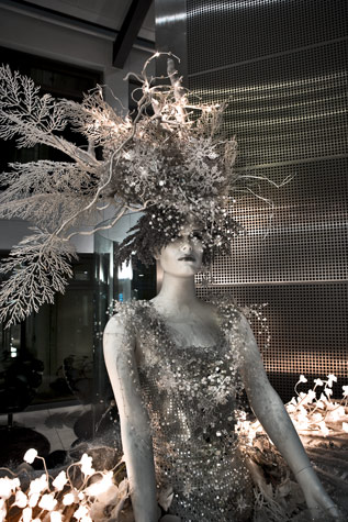 6.	Detail of a five meter tall Ice Queen mannequin styled to fit in with the theme party /event White Christmas at Copenhagen Island Hotel. Her dress was made out of silver lame and sequins, her headdress  silver branches, white flowers and small fairy lights